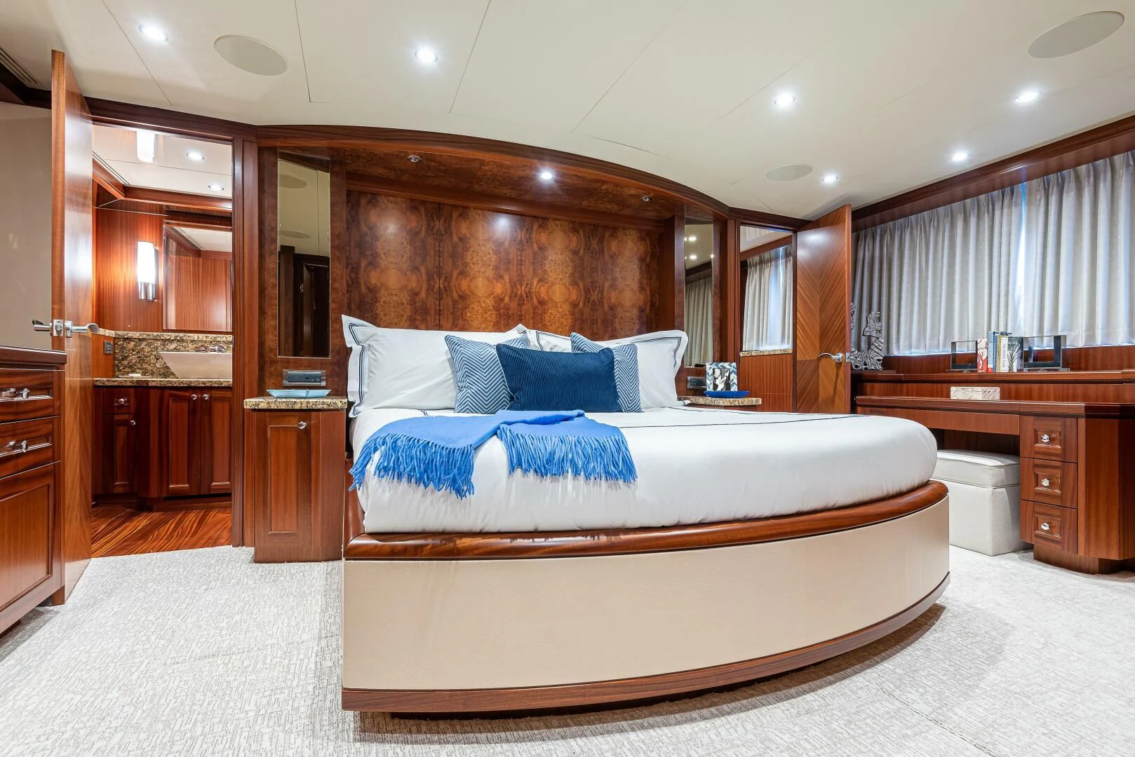 a large bed in a hotel room aboard RHYTHM'N BLUES Yacht for Sale