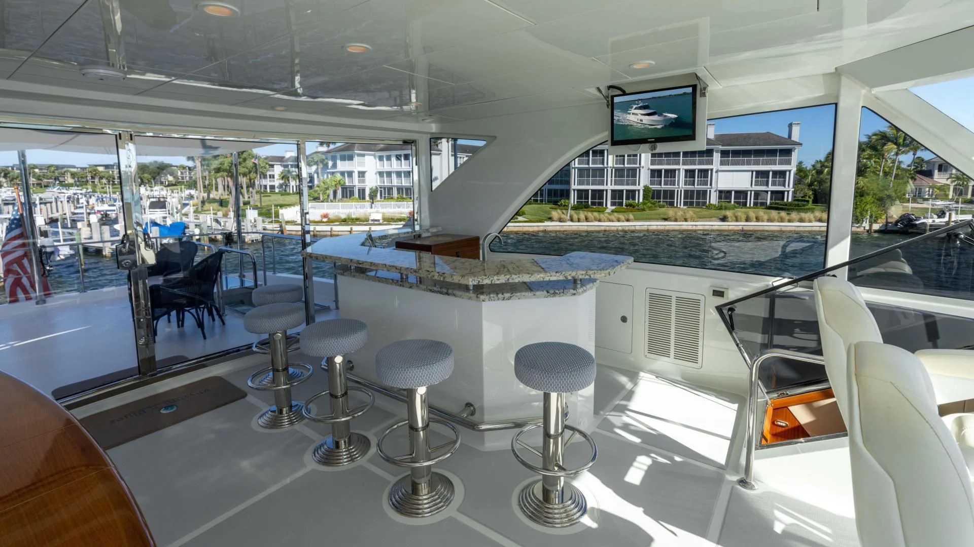 a room with chairs and tables aboard RHYTHM'N BLUES Yacht for Sale