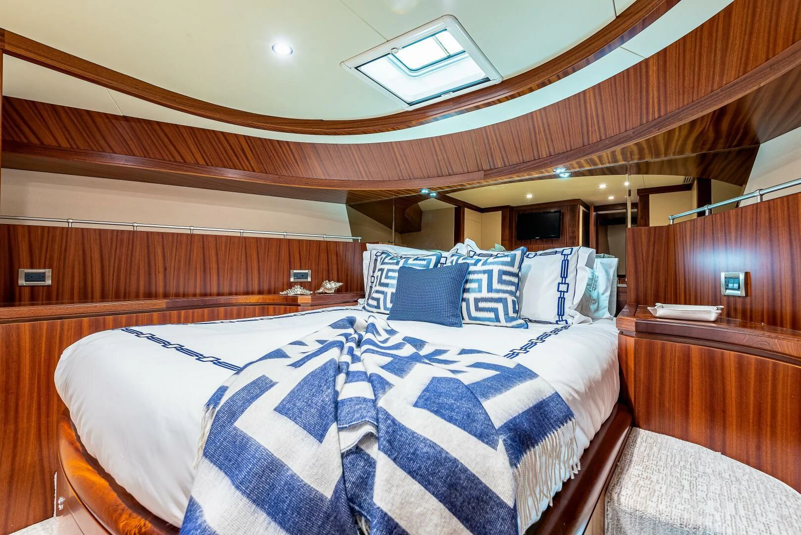 a room with a bed and a wood wall aboard RHYTHM'N BLUES Yacht for Sale