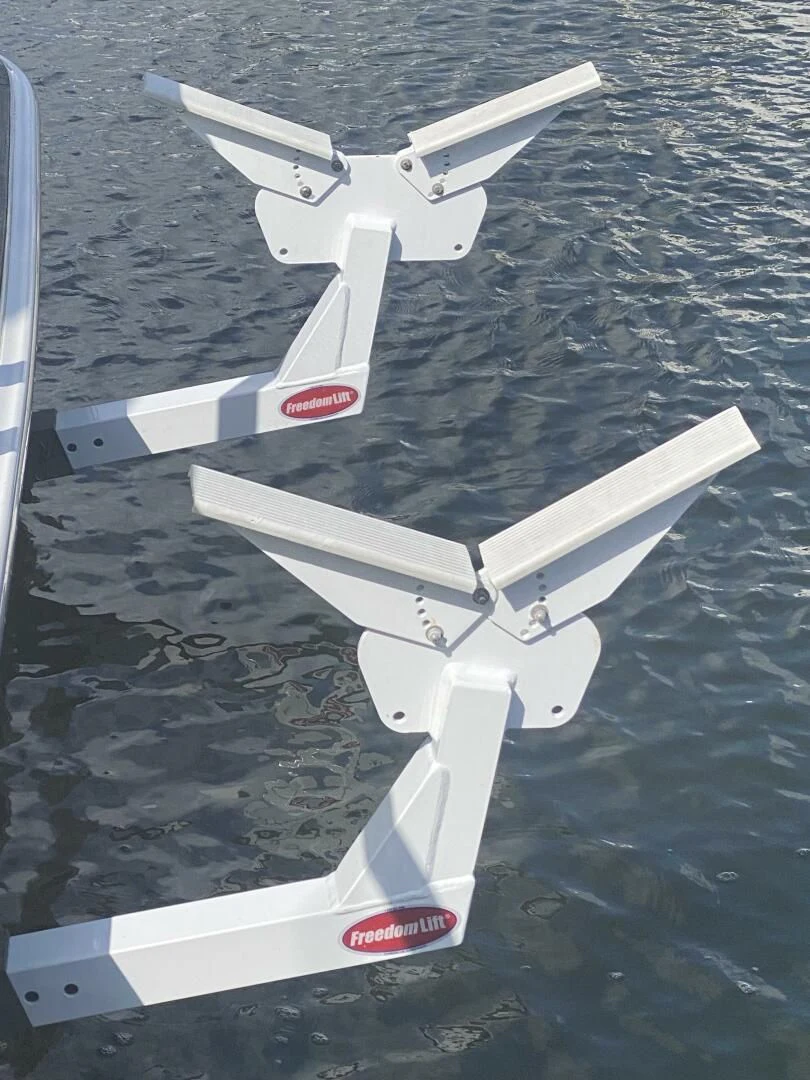 a jet flying over water aboard RHYTHM'N BLUES Yacht for Sale