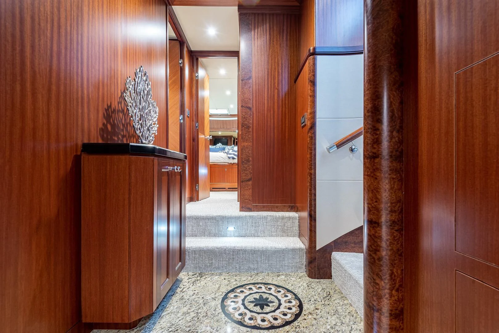 a hallway with wood doors aboard RHYTHM'N BLUES Yacht for Sale