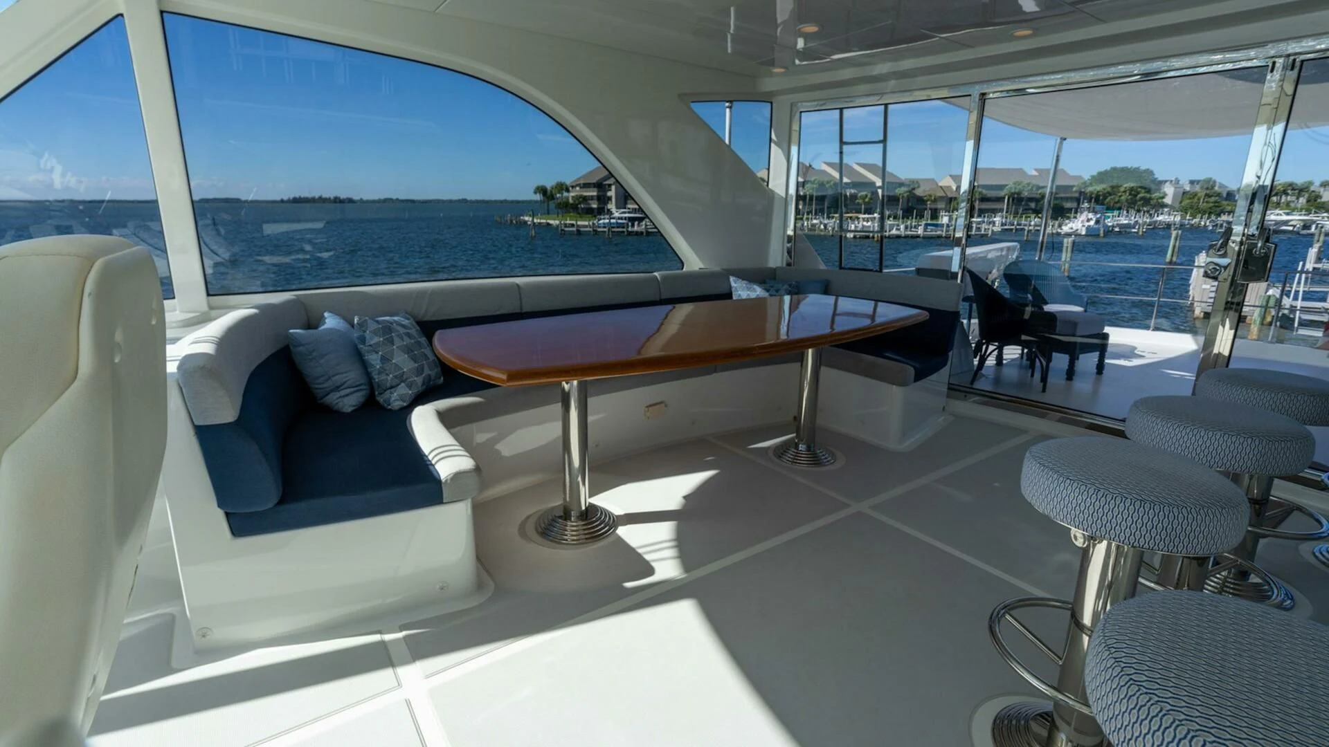 a room with a table and chairs aboard RHYTHM'N BLUES Yacht for Sale