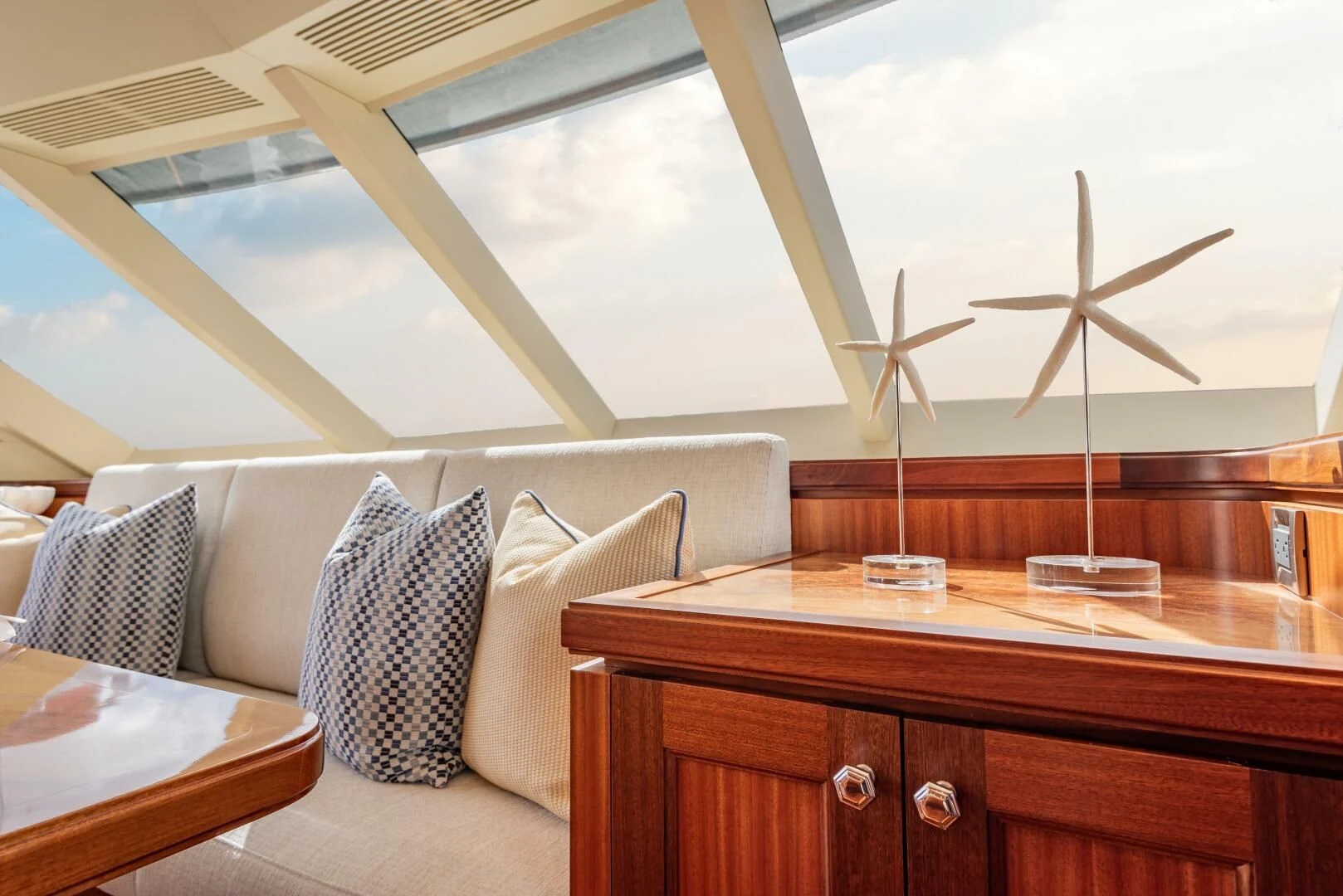 a room with a table and chairs aboard RHYTHM'N BLUES Yacht for Sale