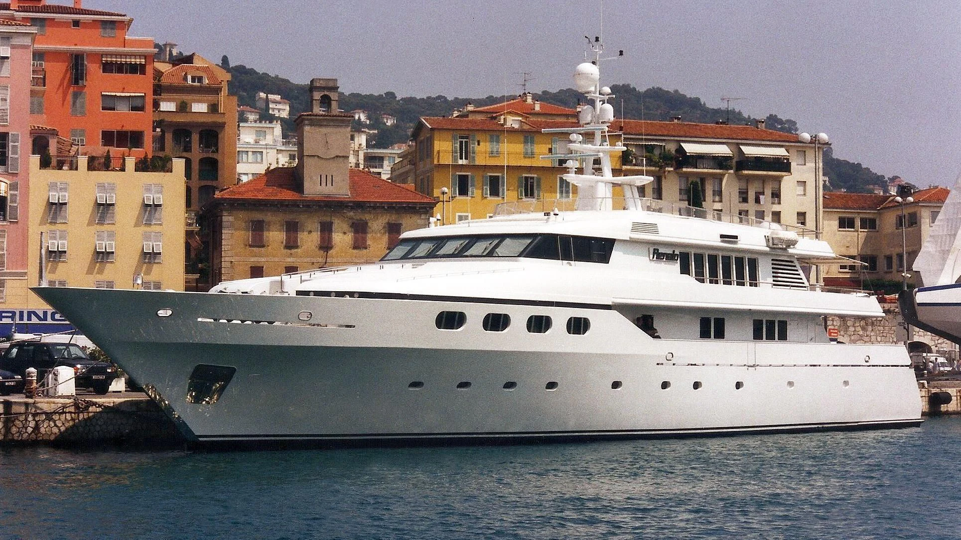 a white yacht in the water aboard CYAN Yacht for Sale