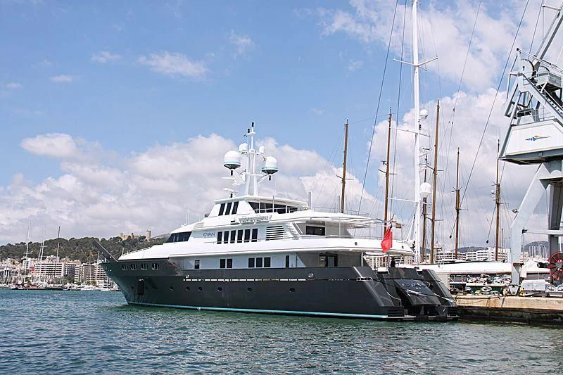 a large boat in the water aboard CYAN Yacht for Sale