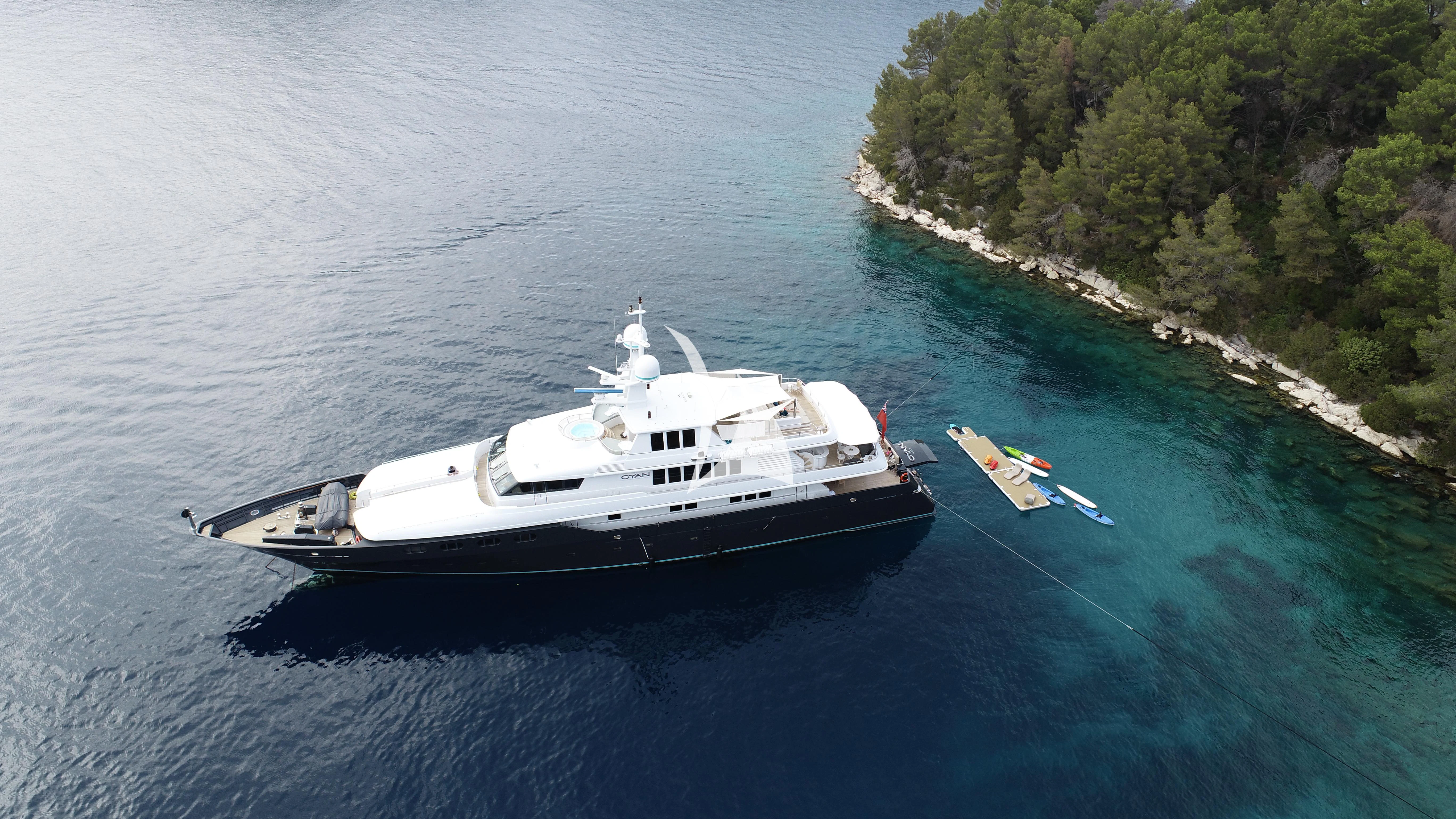 a boat sailing on the water aboard CYAN Yacht for Sale