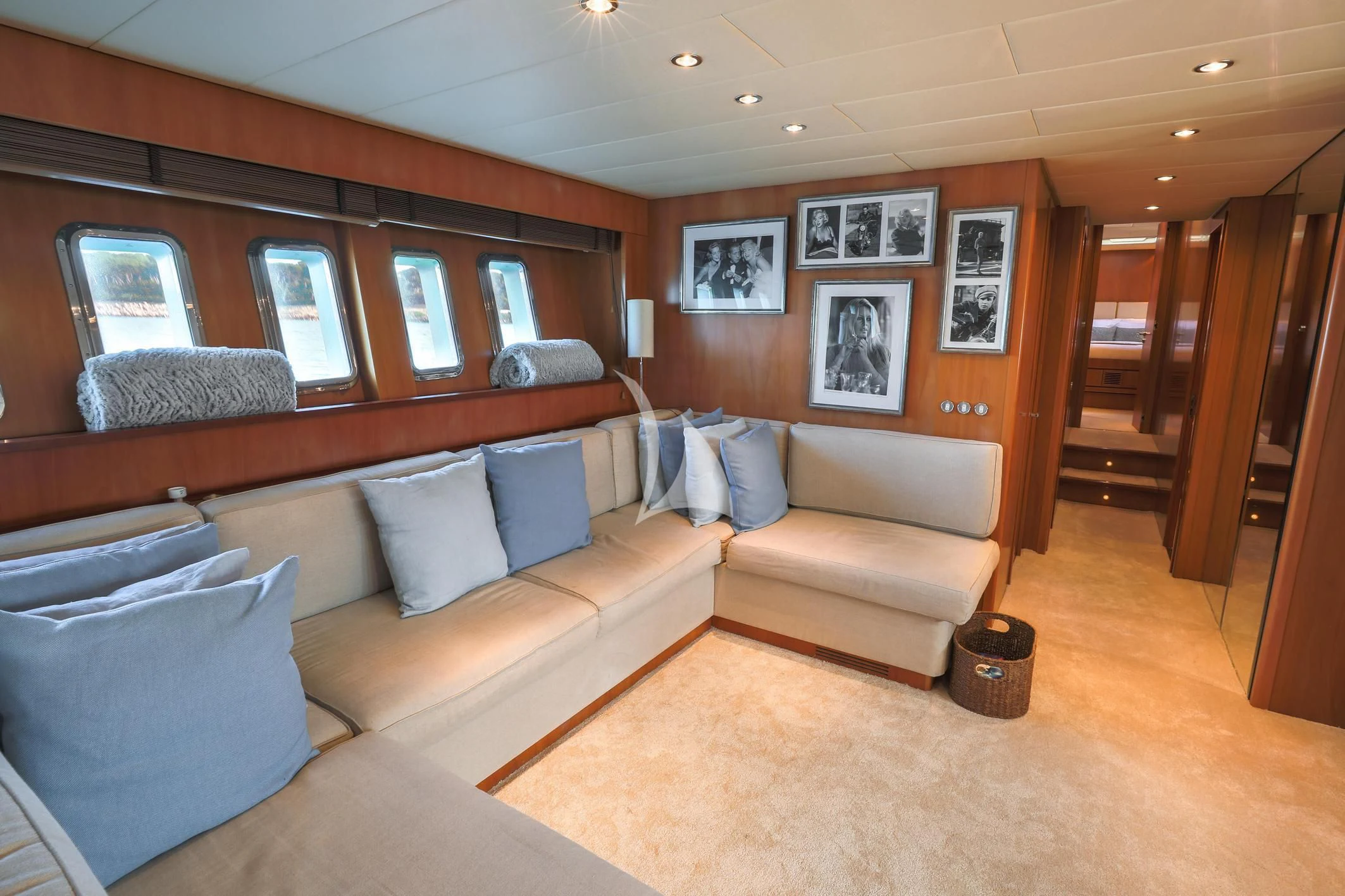 a living room with a couch and a television aboard ELLERY A Yacht for Sale
