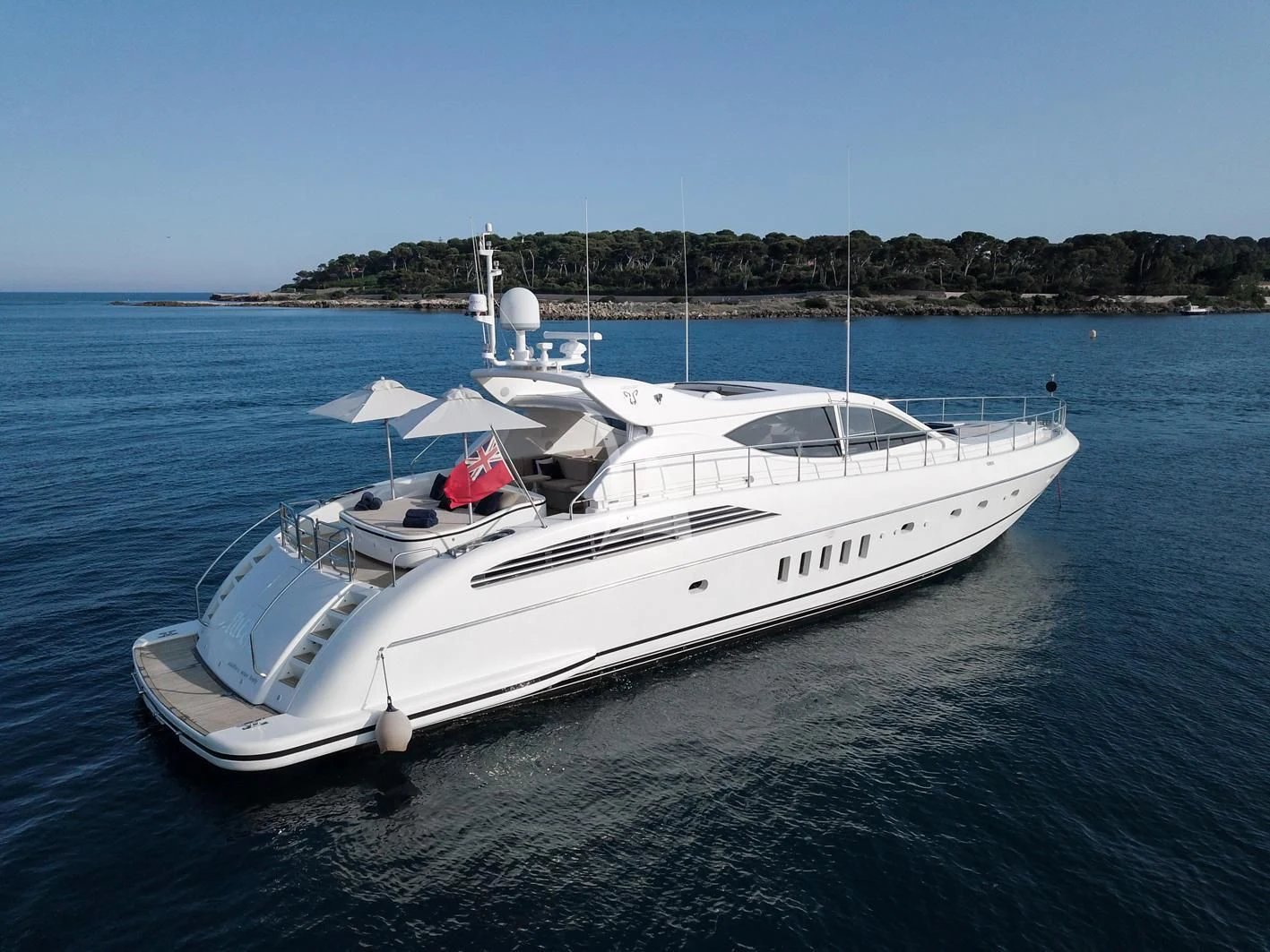 a white boat in the water aboard ELLERY A Yacht for Sale