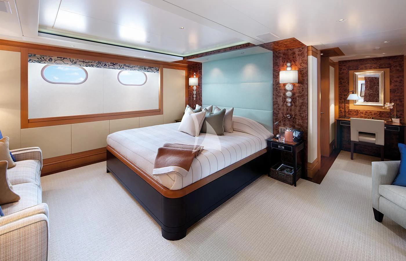 a large bedroom with a large bed aboard LADY BRITT Yacht for Charter