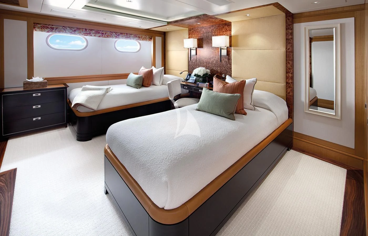 a hotel room with a bed and a desk aboard LADY BRITT Yacht for Charter