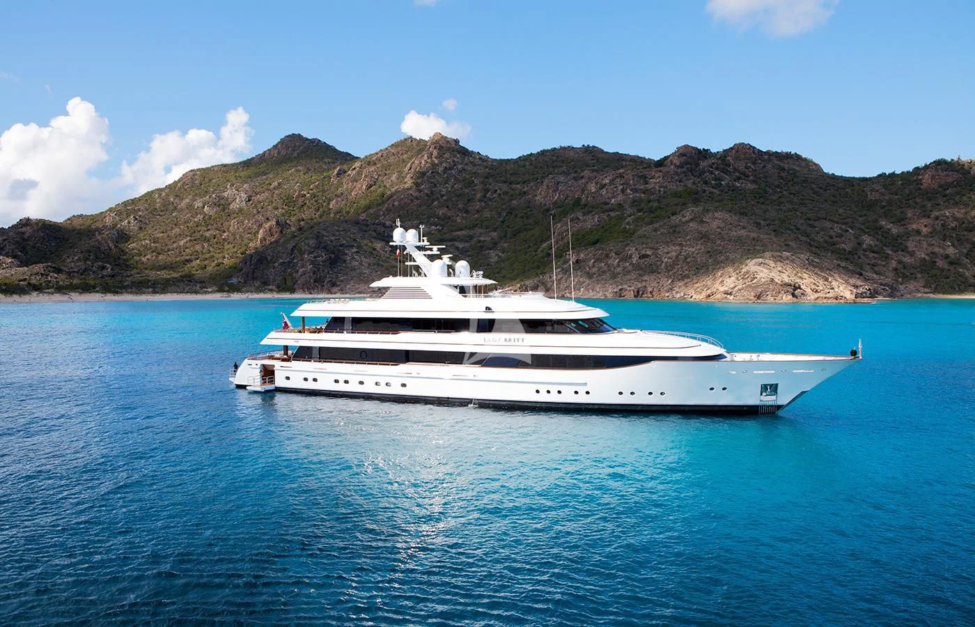 a white boat in the water aboard LADY BRITT Yacht for Charter