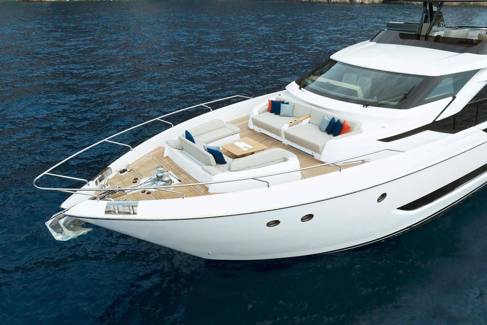 a white boat on the water aboard BESO Yacht for Sale