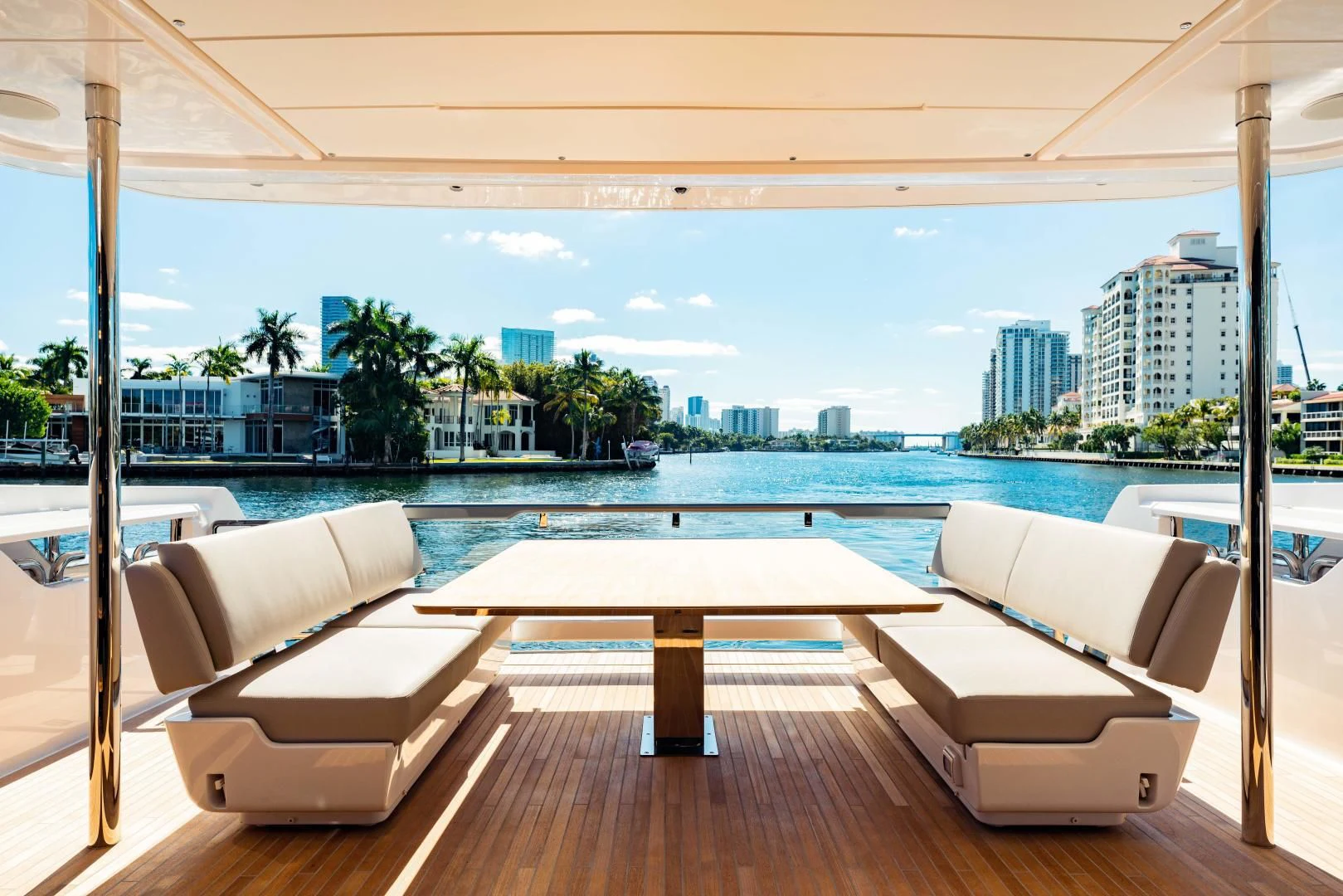 a room with a pool and a city in the background aboard BESO Yacht for Sale