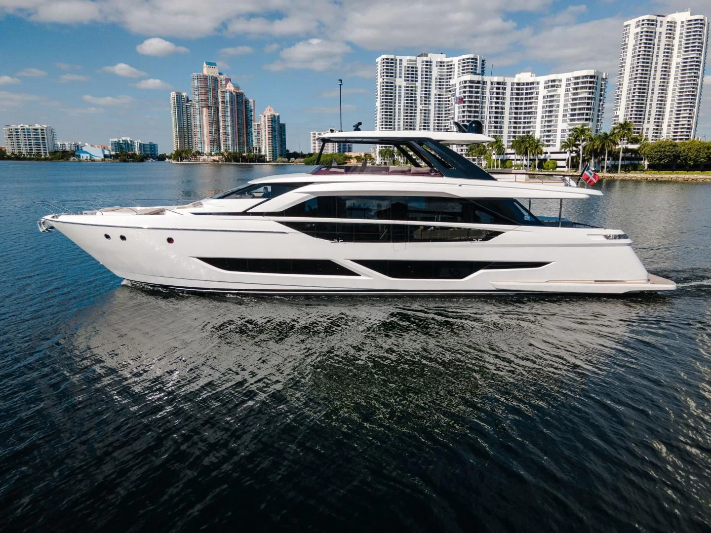 a white yacht in the water aboard BESO Yacht for Sale