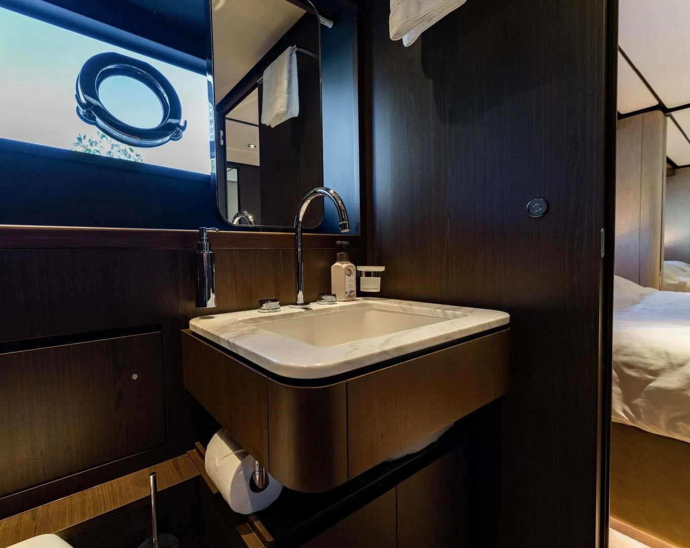 a bathroom with a sink and a mirror aboard BESO Yacht for Sale