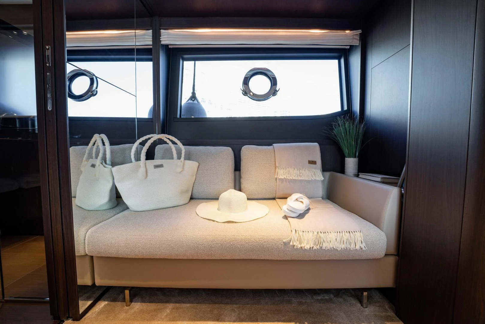 a bed with pillows and a pillow aboard BESO Yacht for Sale