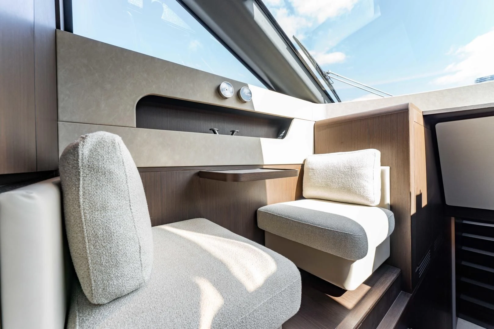 a room with a couch and a window aboard BESO Yacht for Sale