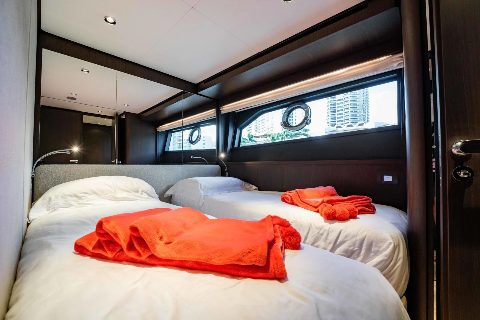 a room with a couple of beds aboard BESO Yacht for Sale