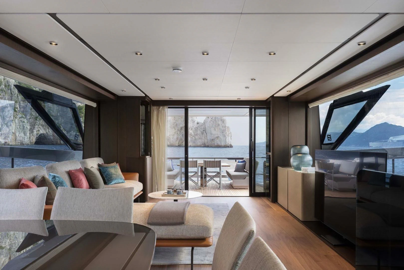 a living room with a large window aboard BESO Yacht for Sale