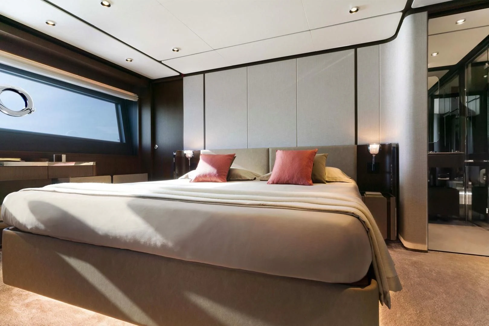 a bed with pillows aboard BESO Yacht for Sale