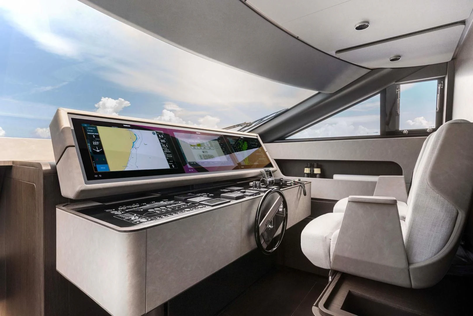 a computer on a table aboard BESO Yacht for Sale