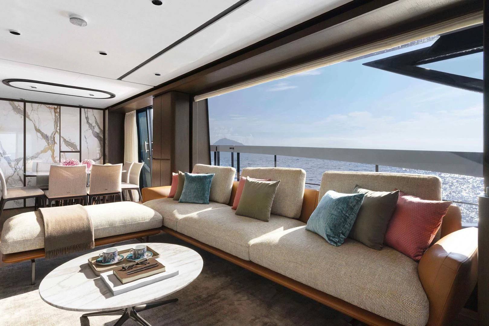 a living room with a large window aboard BESO Yacht for Sale