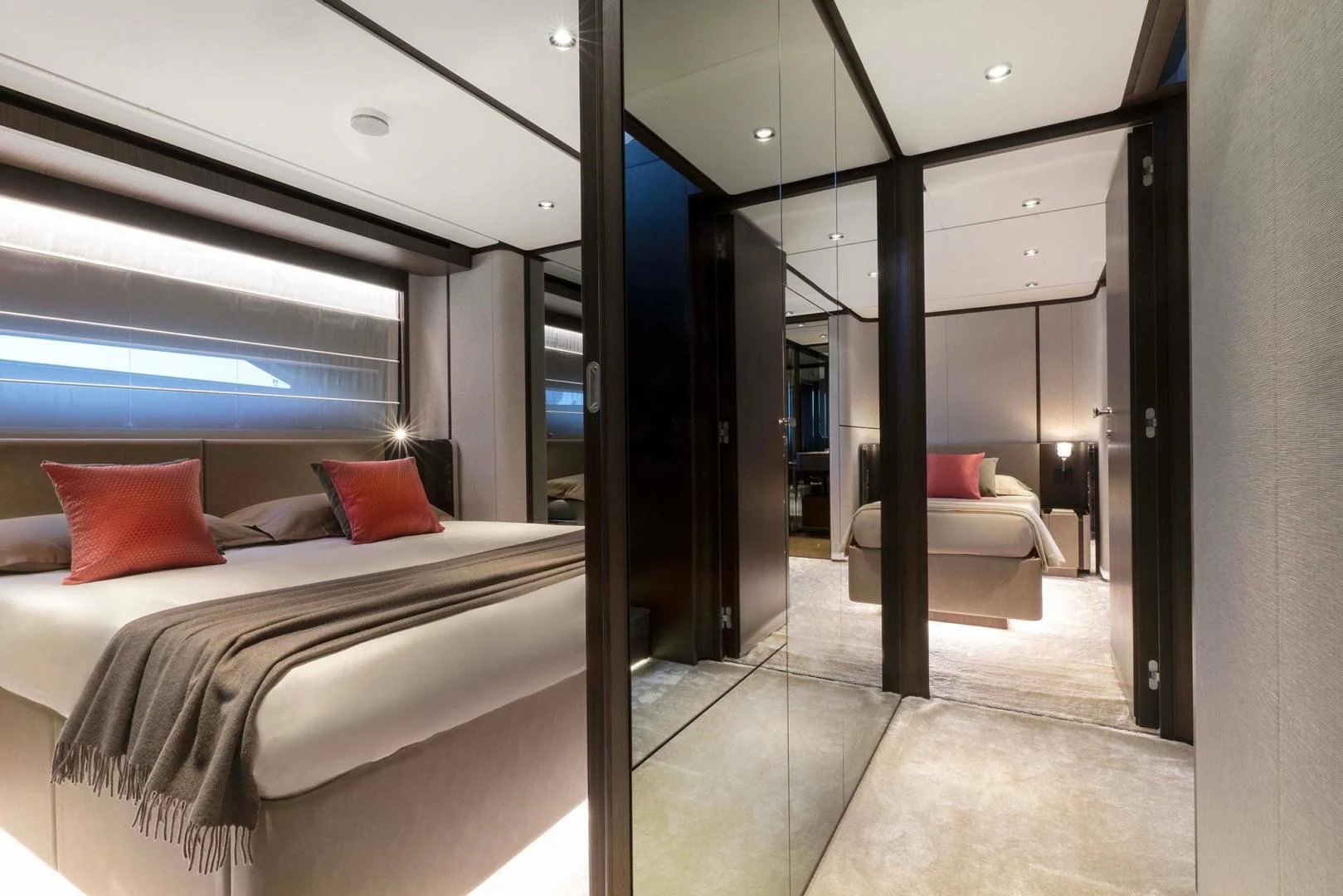 a room with a bed and a window aboard BESO Yacht for Sale
