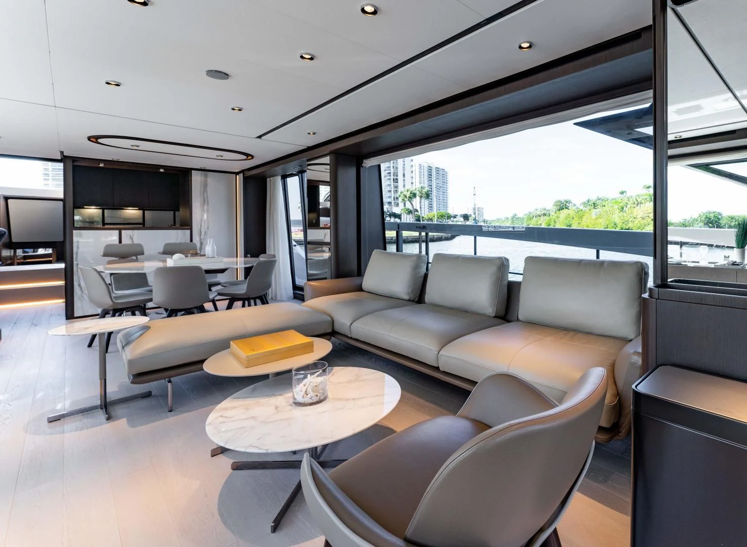 a room with a couch and a table and chairs aboard BESO Yacht for Sale