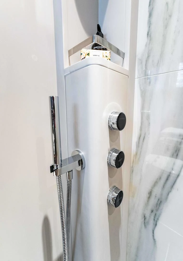 a metal door with a light on it aboard BESO Yacht for Sale