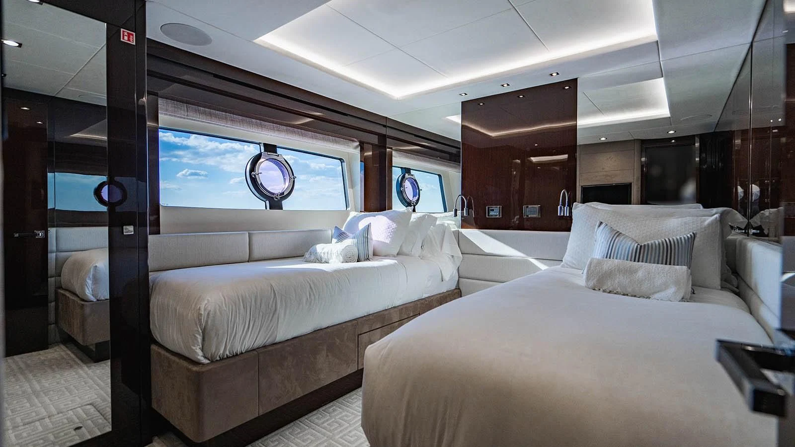 a room with two beds aboard GOLDEN OURS Yacht for Sale