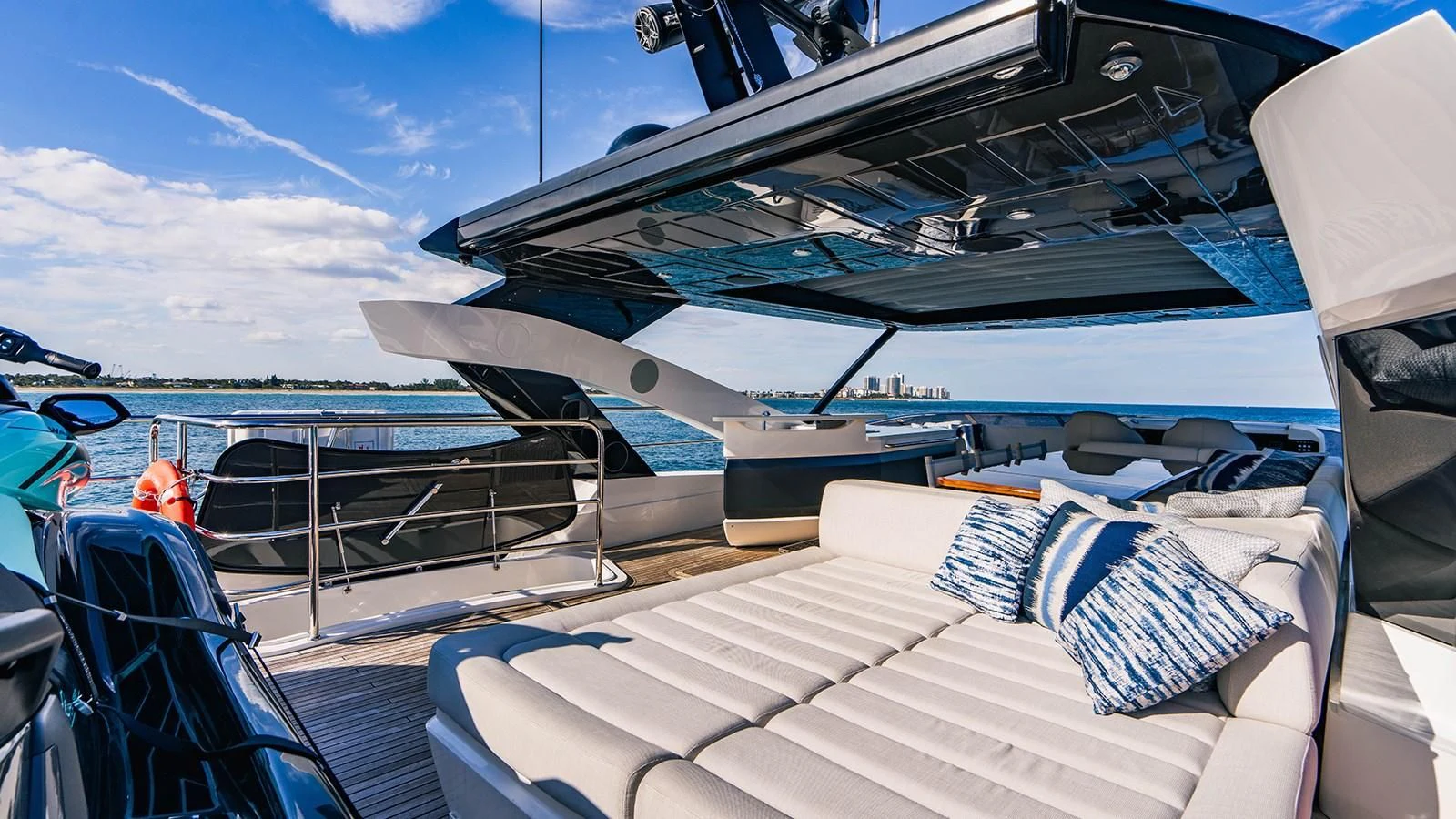 a boat with a deck and a deck and a deck with a blue sky aboard GOLDEN OURS Yacht for Sale
