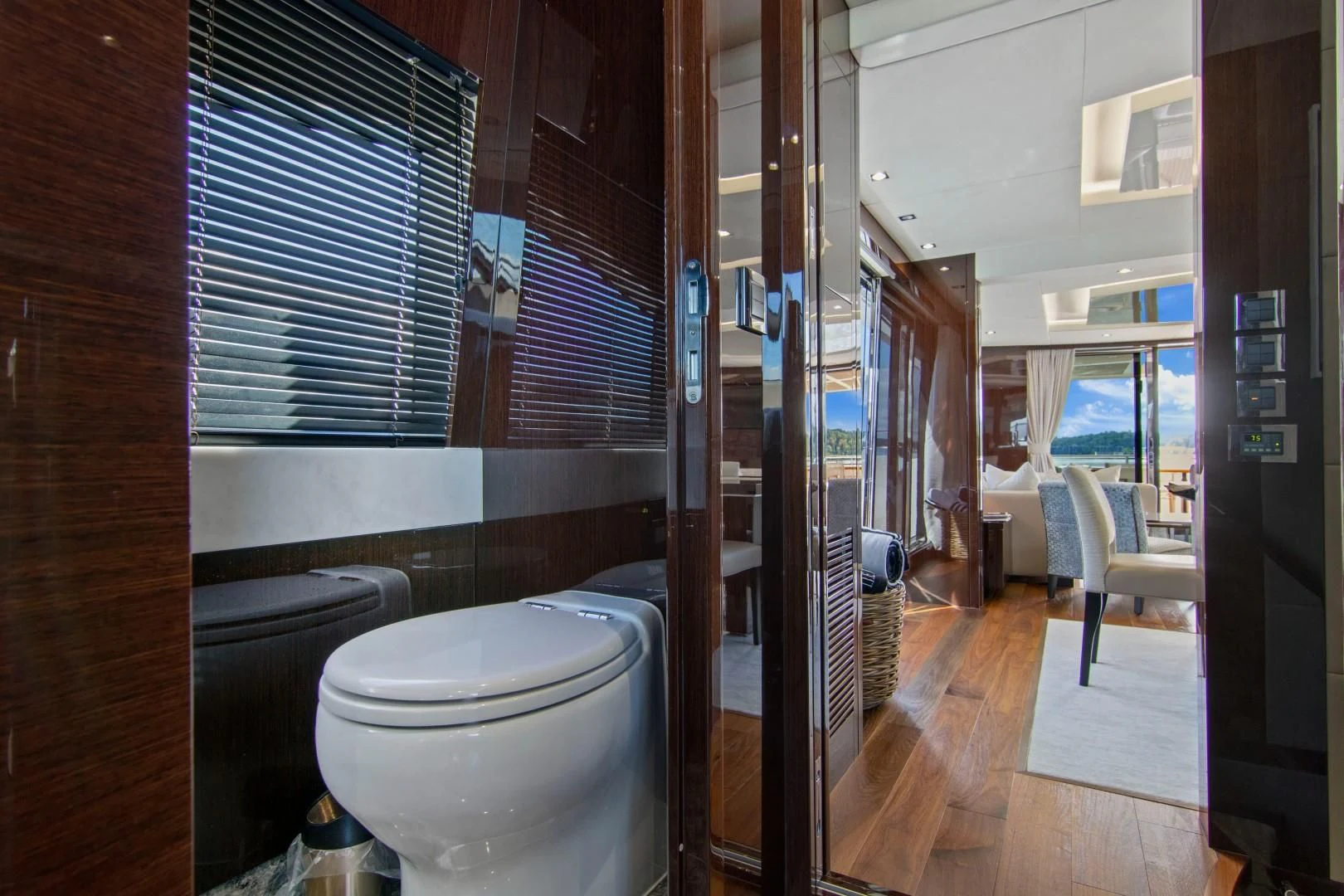 a bathroom with a toilet and a sink aboard GOLDEN OURS Yacht for Sale
