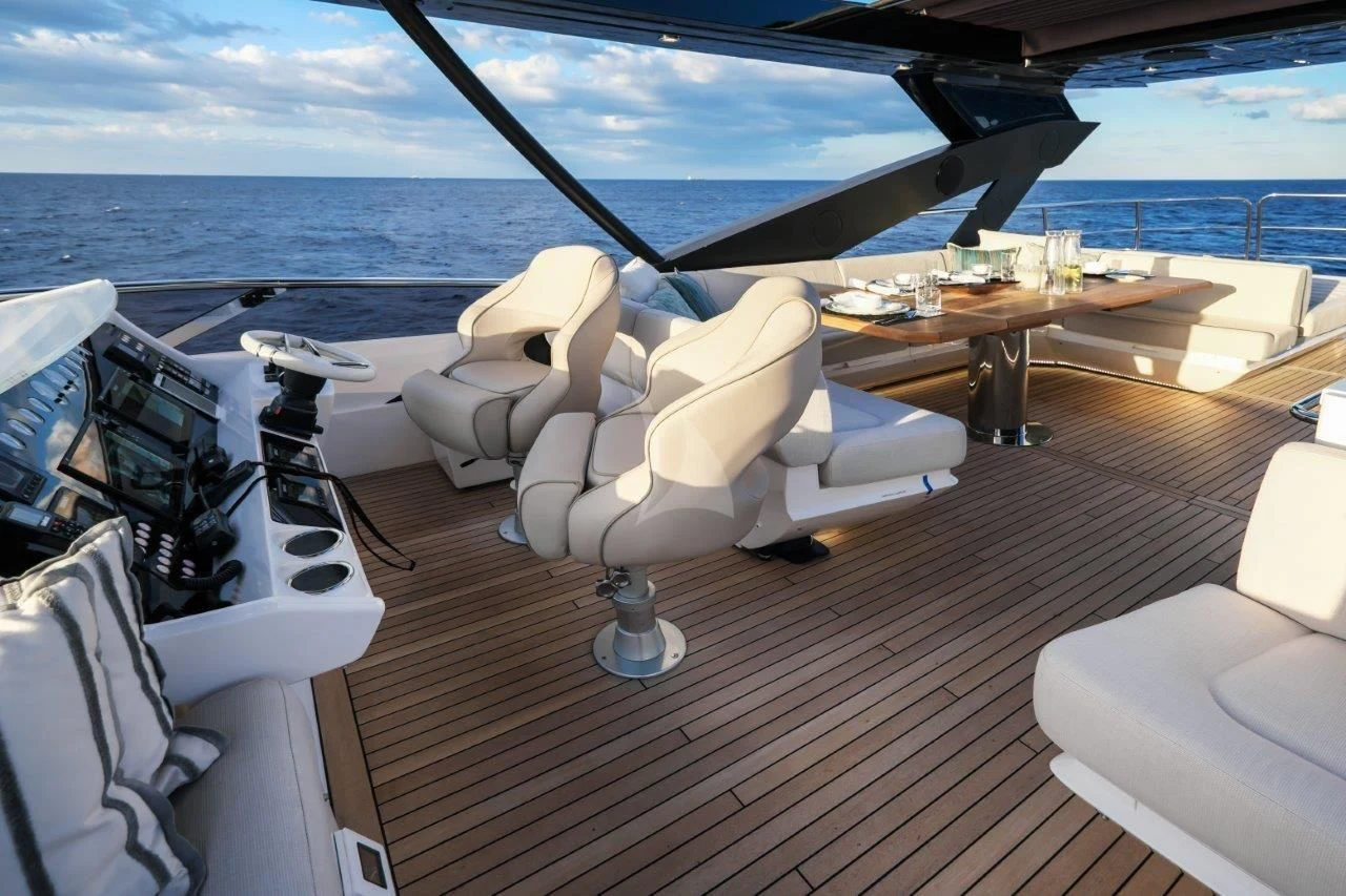 a deck with a view of the ocean and the deck aboard GOLDEN OURS Yacht for Sale