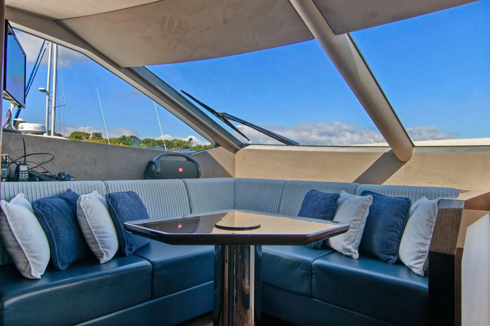 a tent with a table and chairs aboard GOLDEN OURS Yacht for Sale
