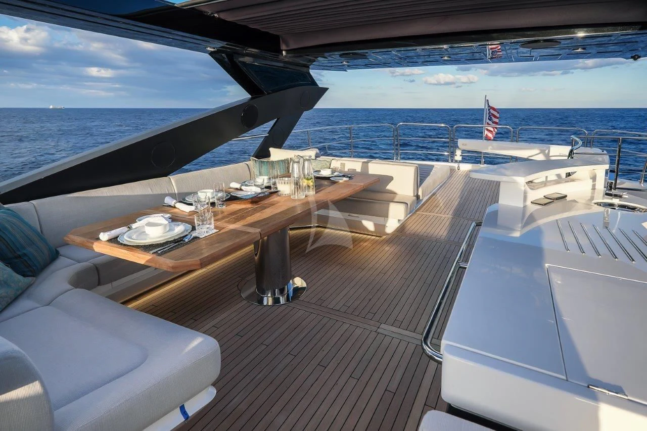 a deck with a view of the ocean and the deck aboard GOLDEN OURS Yacht for Sale