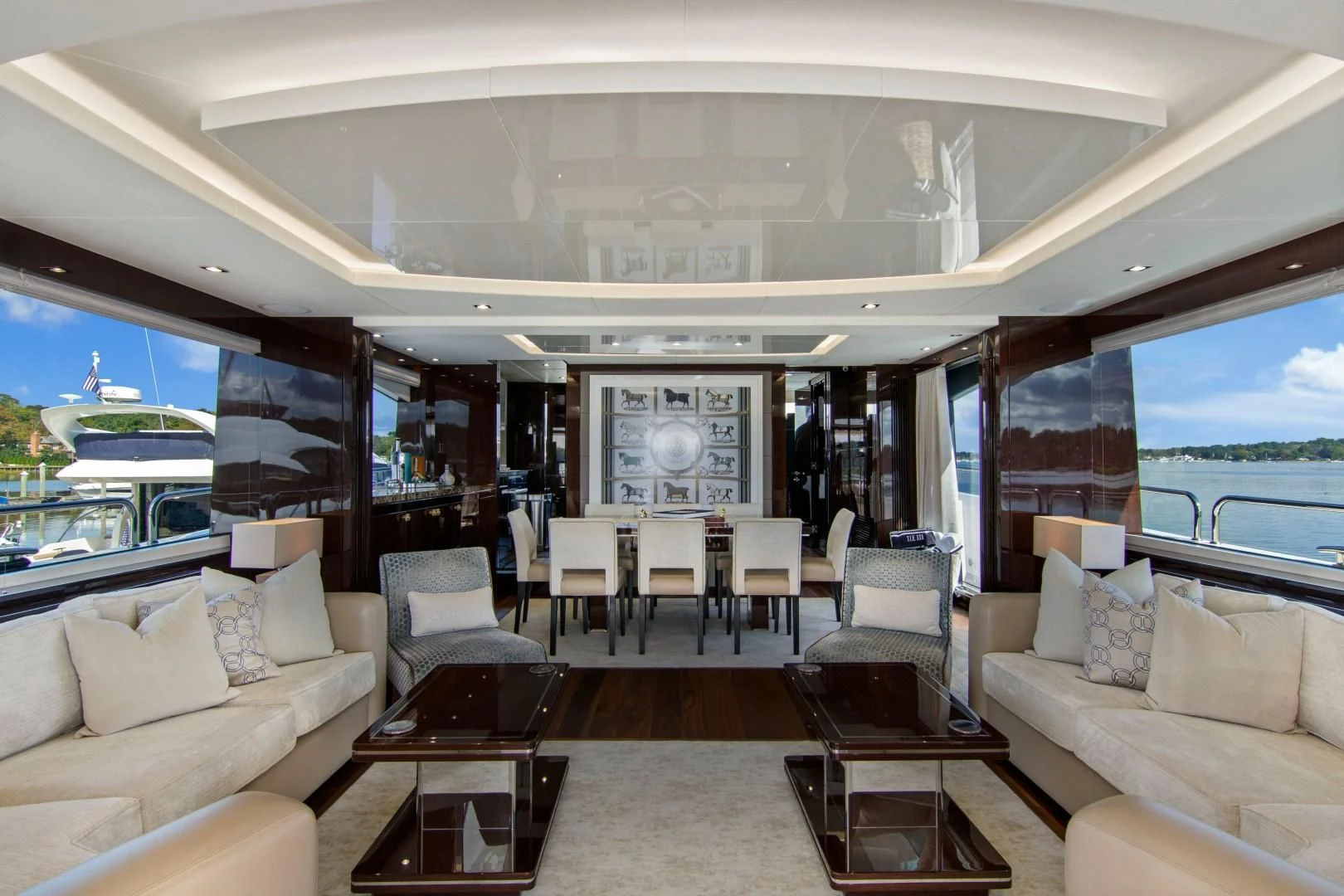 a living room with a large window aboard GOLDEN OURS Yacht for Sale