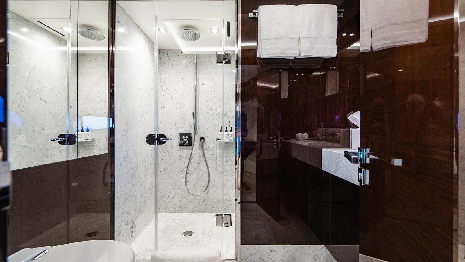 a bathroom with a shower aboard GOLDEN OURS Yacht for Sale