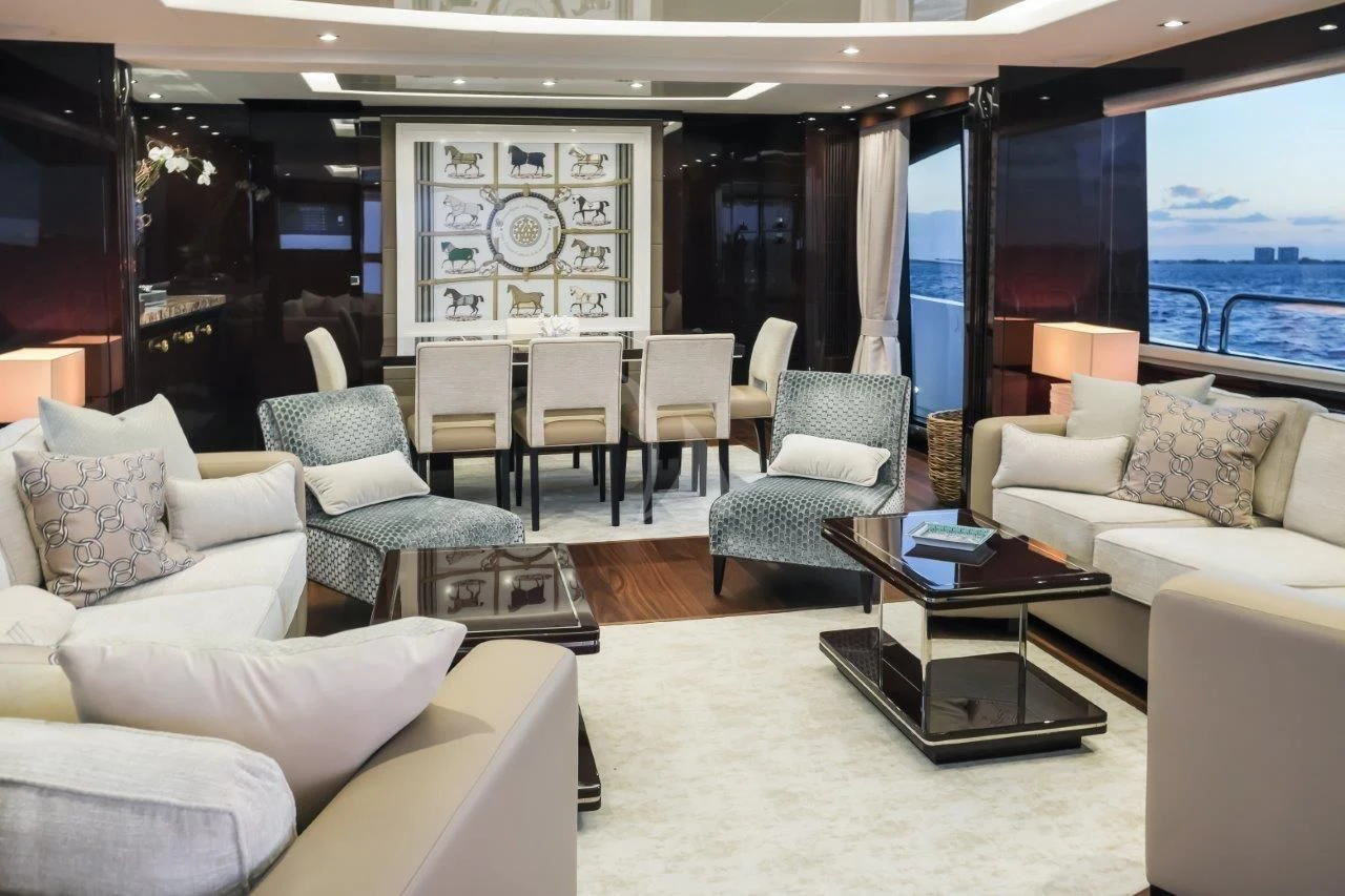a living room with a large window aboard GOLDEN OURS Yacht for Sale