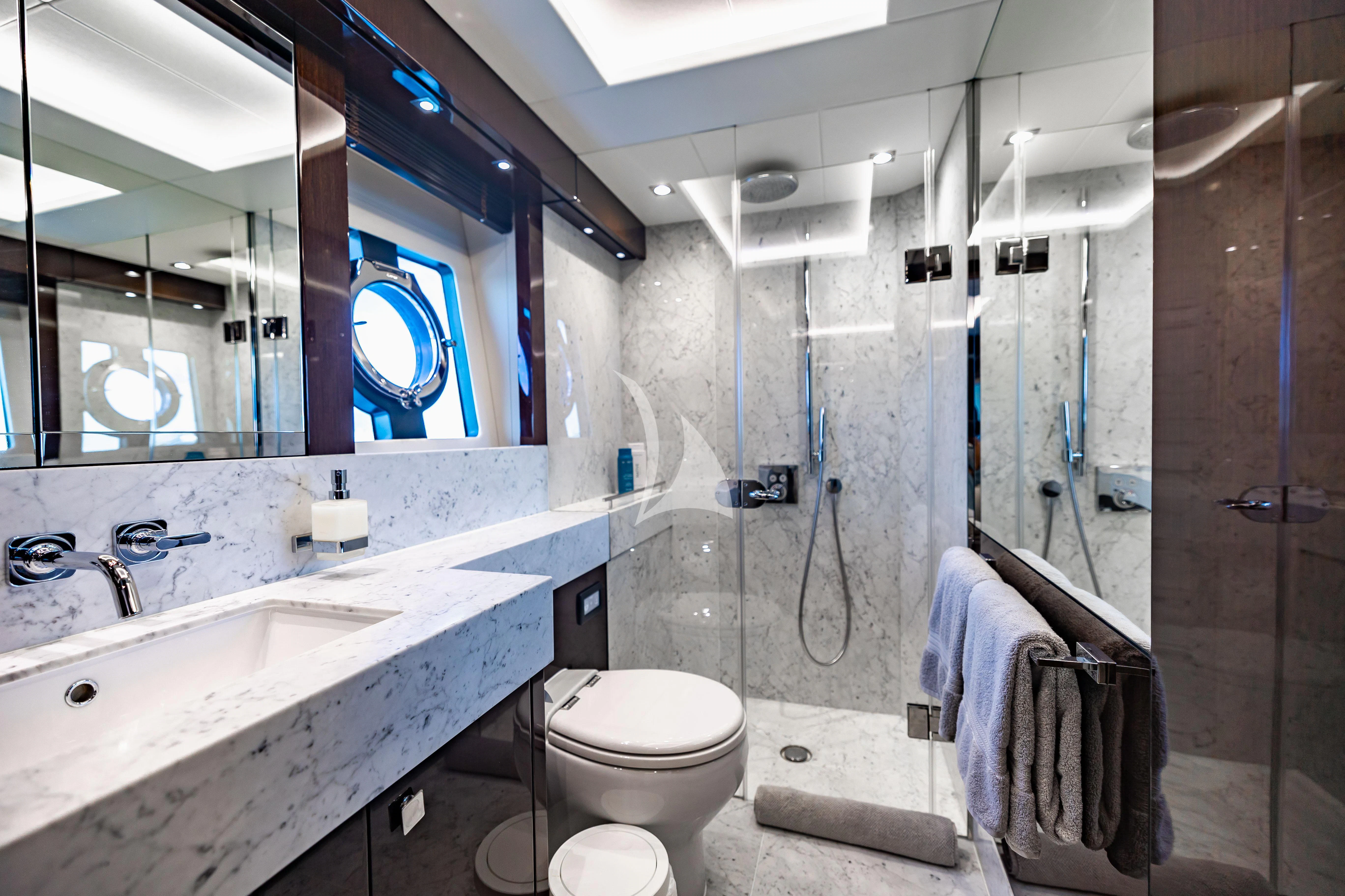 a bathroom with a sink toilet and a shower aboard GOLDEN OURS Yacht for Sale