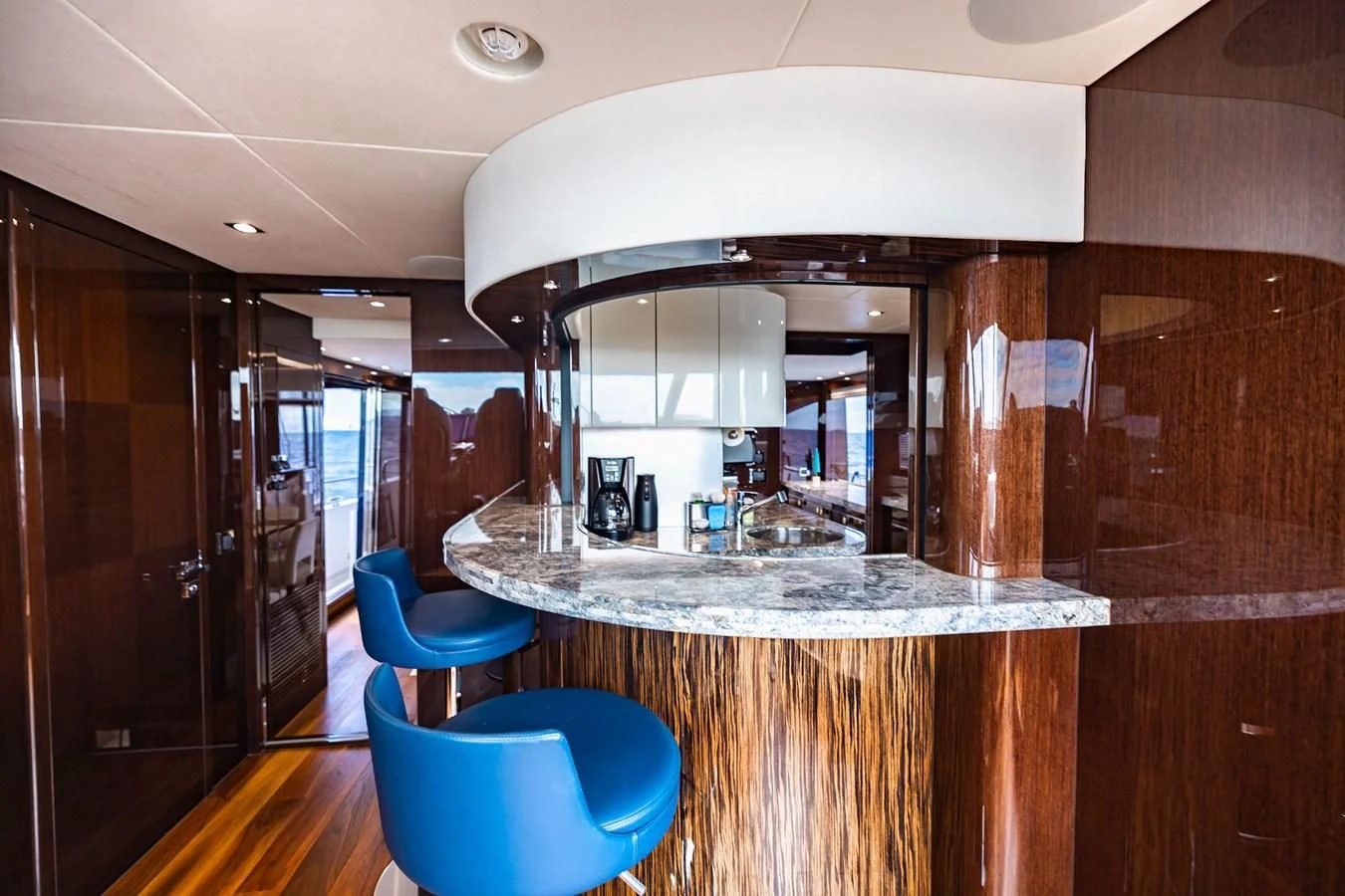 a bar with a large mirror aboard GOLDEN OURS Yacht for Sale