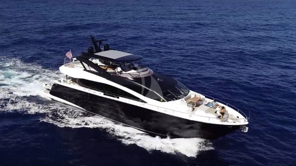 a white and black boat aboard GOLDEN OURS Yacht for Sale