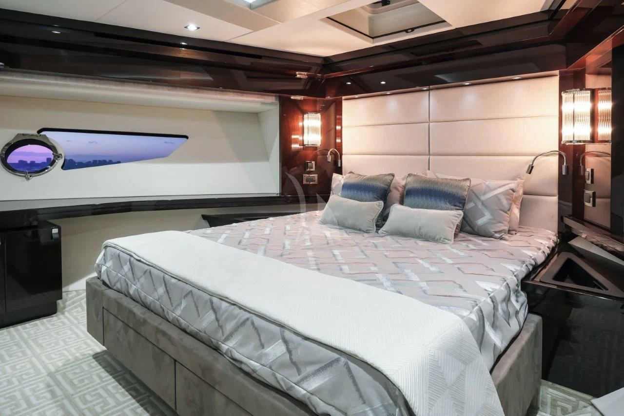 a room with a large bed aboard GOLDEN OURS Yacht for Sale