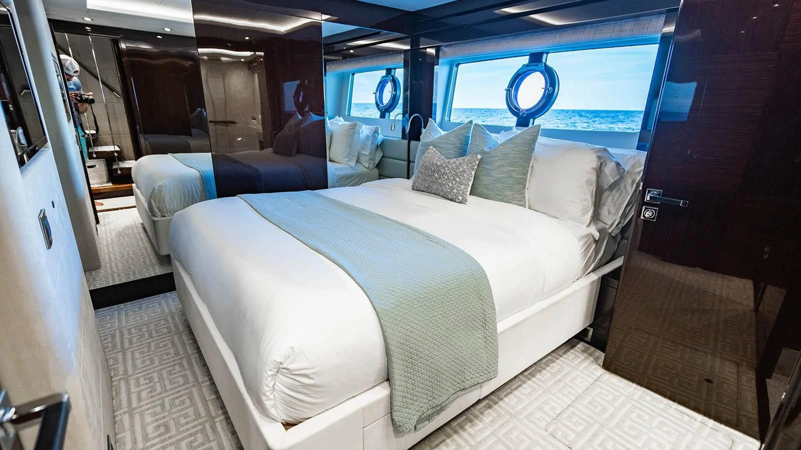 a room with a bed and a window aboard GOLDEN OURS Yacht for Sale