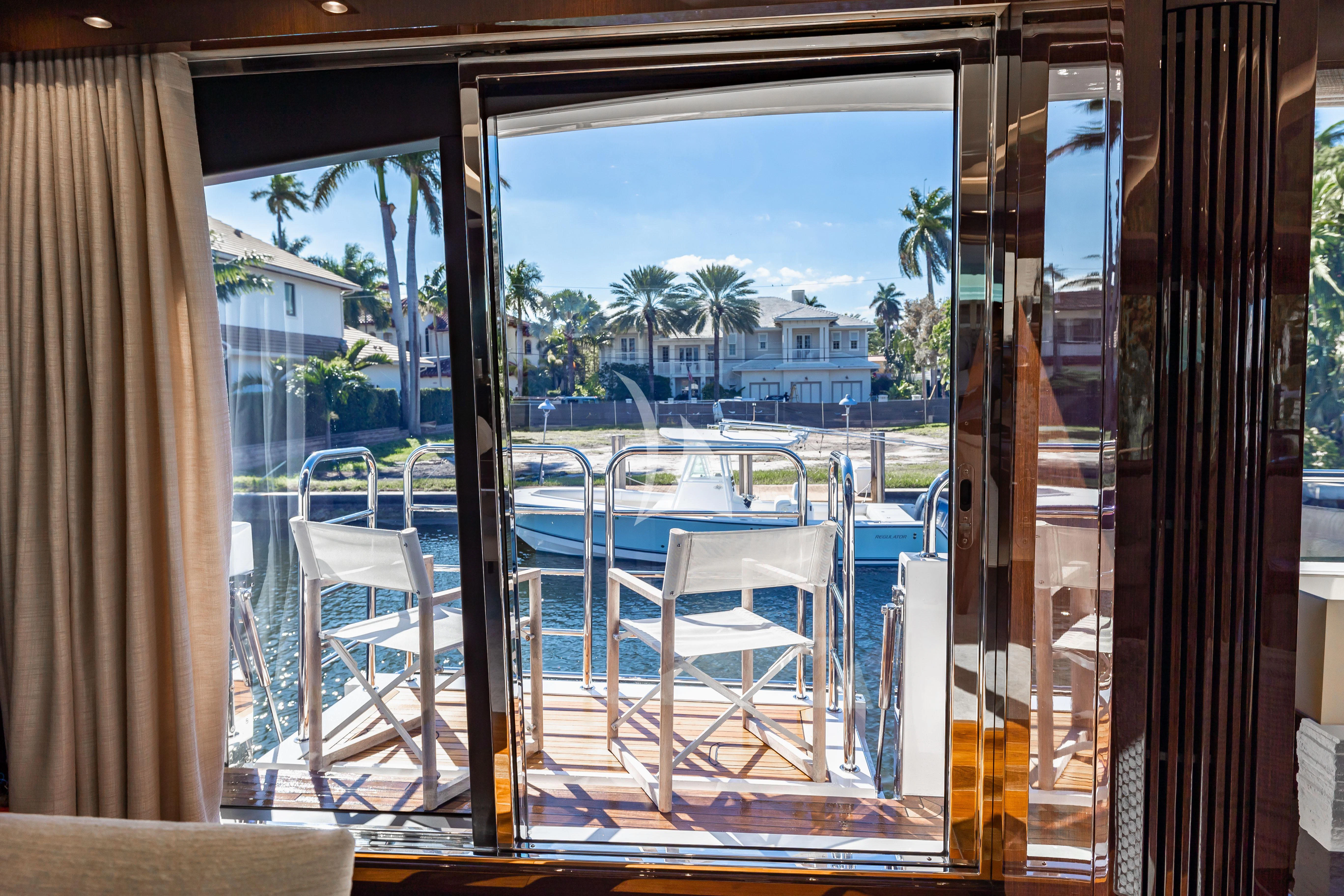 a balcony with a pool aboard GOLDEN OURS Yacht for Sale