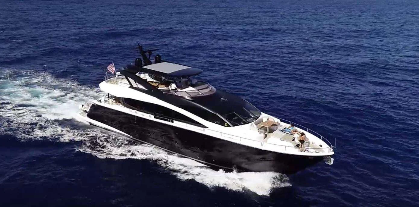 a white and black boat aboard GOLDEN OURS Yacht for Sale