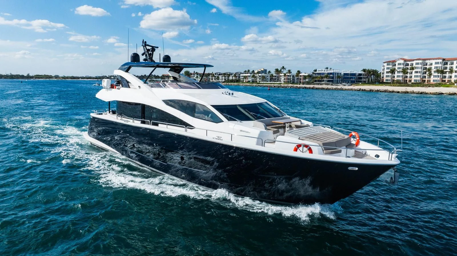 a white yacht on the water aboard GOLDEN OURS Yacht for Sale