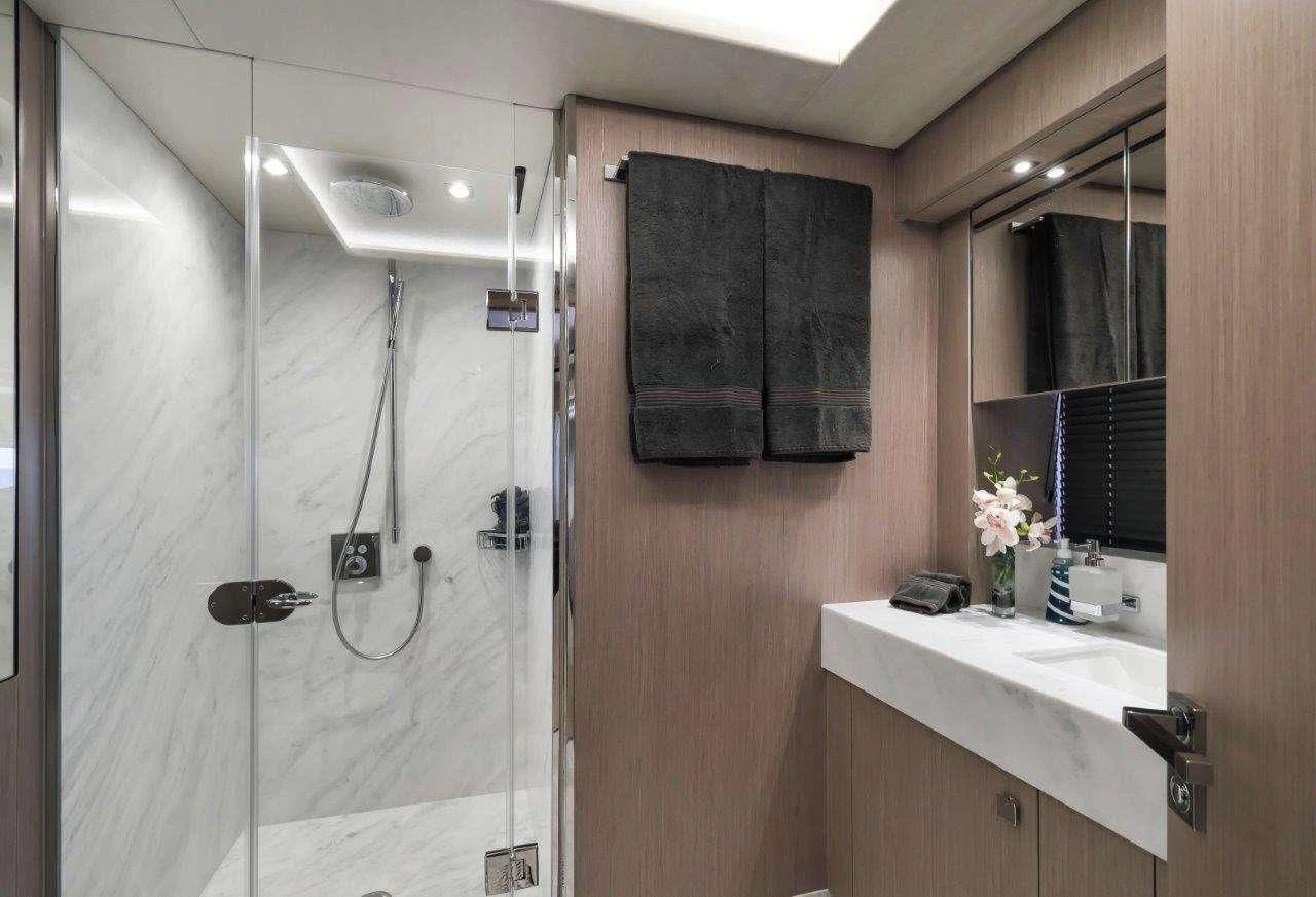 a shower unit in a bathroom aboard GOLDEN OURS Yacht for Sale
