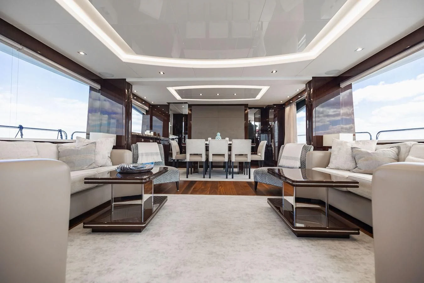 a room with a couch and a table aboard GOLDEN OURS Yacht for Sale
