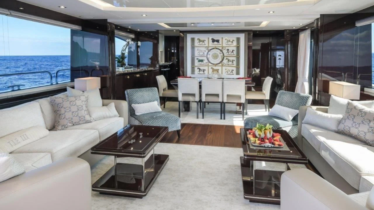 a living room with a large window aboard GOLDEN OURS Yacht for Sale