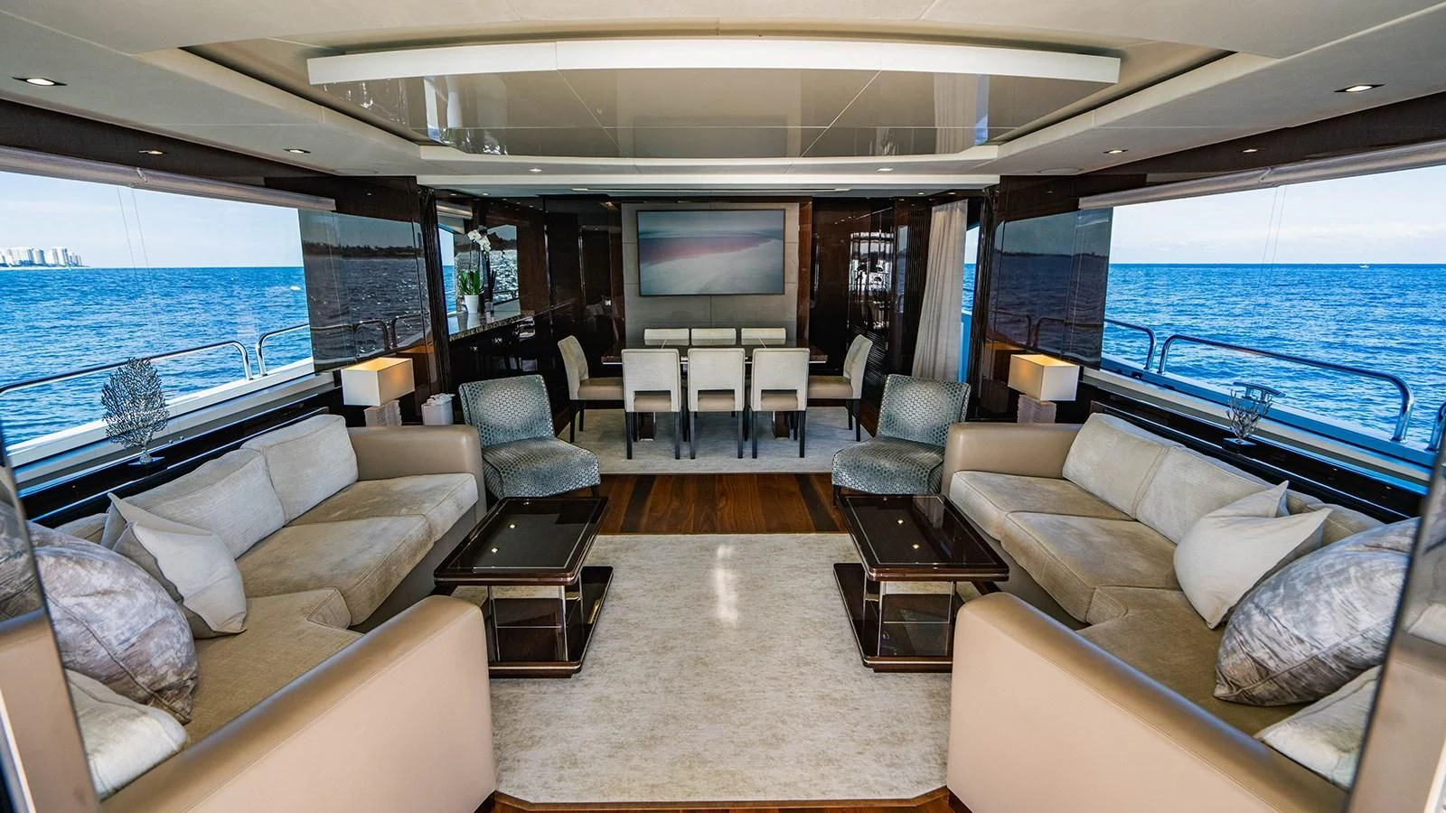 a living room with a large window aboard GOLDEN OURS Yacht for Sale